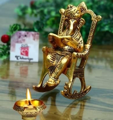 Golden Lord Ganesha Statue Sitting On A Rocking Chair And Reading Ramayan Showpiece LASATECH